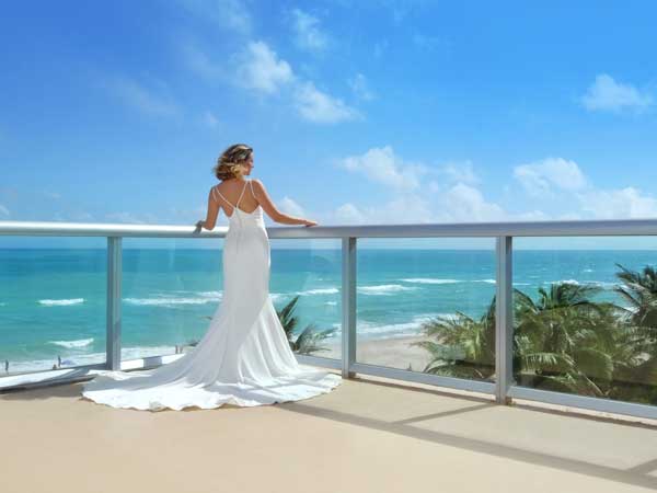 Bride on balcony at Solé Miami beach resort