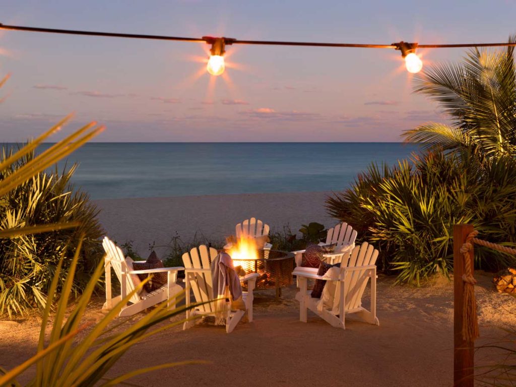 Firepit at beach in evening, at Solé Miami