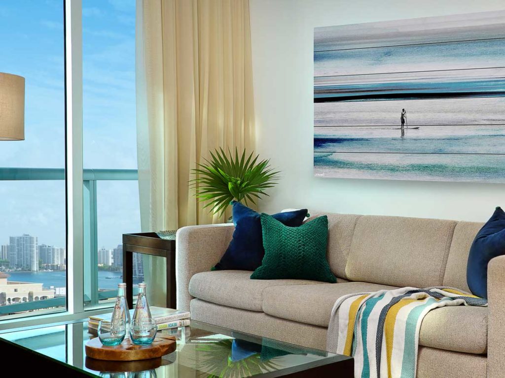 Suite Living Room With A City And Ocean View.