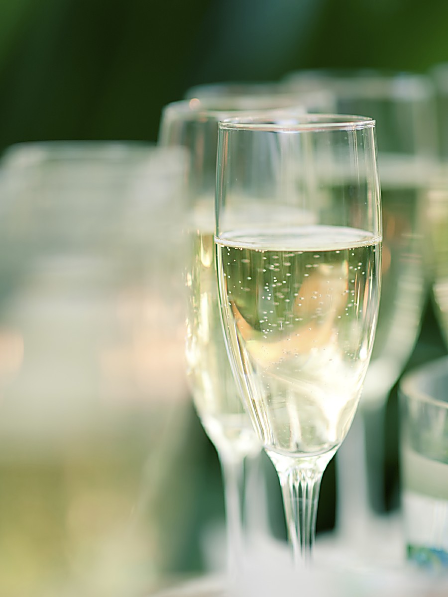 Champagne flutes filled with sparkling wine at a celebration event at Sole Miami, A Noble House Resort on Sunny Isles Beach